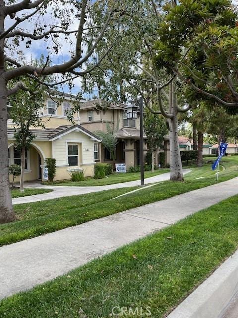 11433 Mountain View Dr Unit 62, Rancho Cucamonga, CA 91730 - view of front facade featuring a front lawn and stucco siding