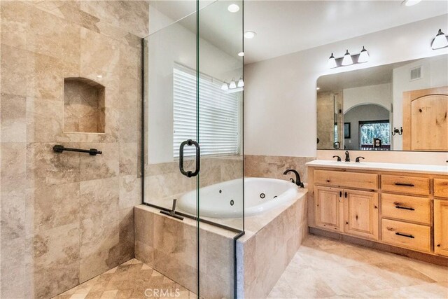 full bathroom featuring recessed lighting, vanity, a tile shower, visible vents, and a jetted tub
