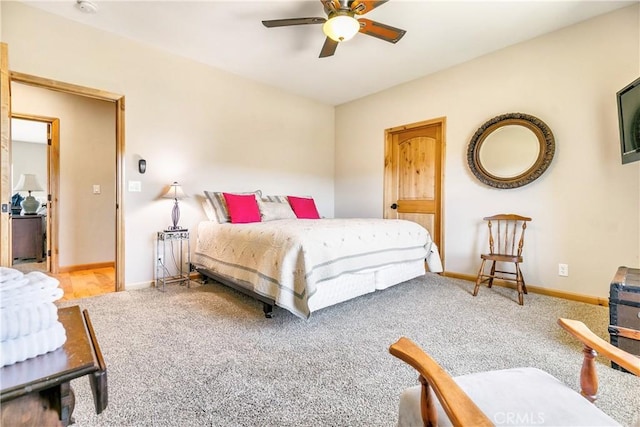 bedroom featuring carpet, ceiling fan, and baseboards