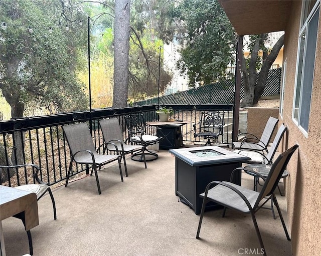 23684 Valley View Rd, Calabasas, CA 91302 - view of patio / terrace with an outdoor fire pit
