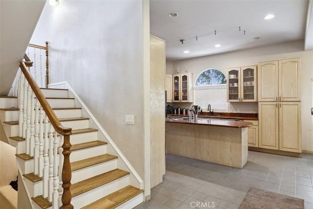 23684 Valley View Rd, Calabasas, CA 91302 - stairs featuring tile patterned floors, recessed lighting, and baseboards