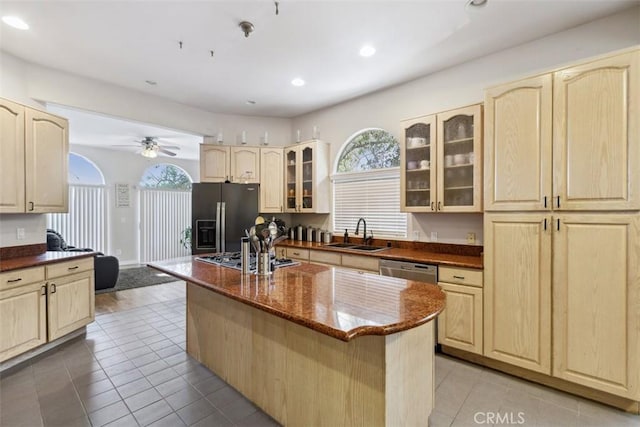 23684 Valley View Rd, Calabasas, CA 91302 - kitchen with light brown cabinetry, a ceiling fan, appliances with stainless steel finishes, and a sink