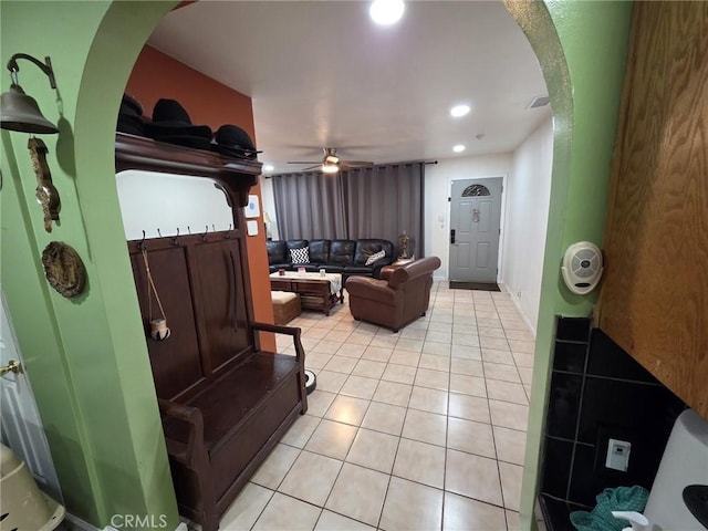 2998 Mary St, Riverside, CA 92506 - living area with light tile patterned floors, a ceiling fan, arched walkways, and recessed lighting
