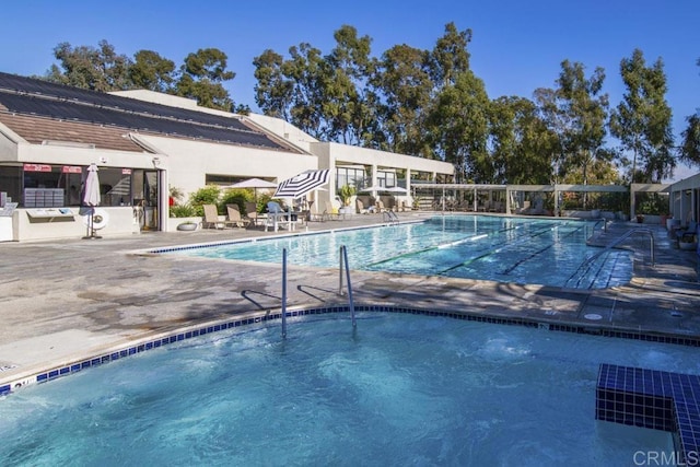 3168 Via Vis Unit B, Laguna Woods, CA 92637 - community pool featuring a patio area