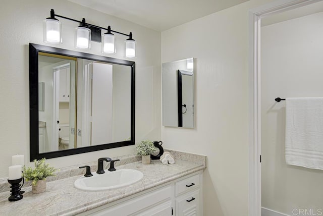 3168 Via Vis Unit B, Laguna Woods, CA 92637 - bathroom with vanity and toilet