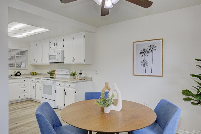 3168 Via Vis Unit B, Laguna Woods, CA 92637 - dining area with a ceiling fan and light wood-type flooring