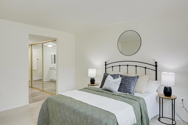3168 Via Vis Unit B, Laguna Woods, CA 92637 - bedroom with carpet flooring, baseboards, and ensuite bathroom
