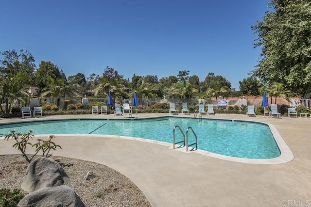 3168 Via Vis Unit B, Laguna Woods, CA 92637 - community pool featuring a patio
