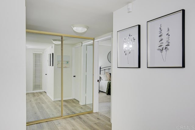 3168 Via Vis Unit B, Laguna Woods, CA 92637 - corridor with wood finished floors and baseboards
