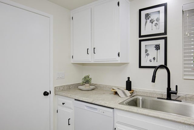 3168 Via Vis Unit B, Laguna Woods, CA 92637 - kitchen with white dishwasher, a sink, white cabinets, and light countertops