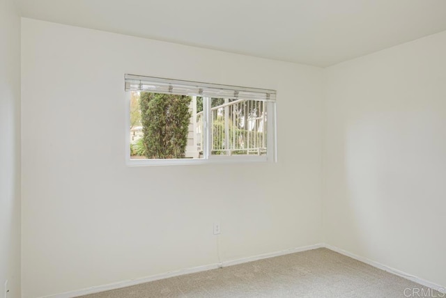 3168 Via Vis Unit B, Laguna Woods, CA 92637 - spare room with light colored carpet and baseboards
