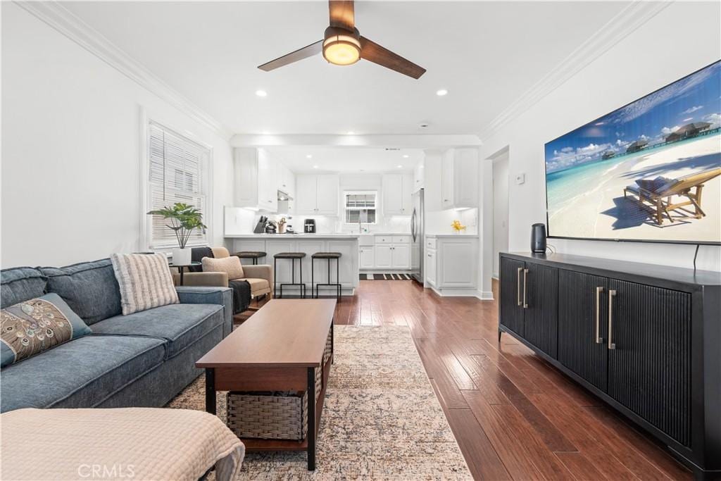 504 Avocado Ave Unit 1/2, Corona Del Mar, CA 92625 - living room featuring recessed lighting, a ceiling fan, dark wood-style flooring, and crown molding
