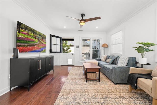 living room featuring recessed lighting, ornamental molding, ceiling fan, wood-type flooring, and baseboards