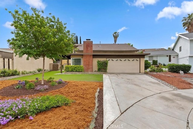 810 Hacienda Dr, Riverside, CA 92507 - single story home with a chimney, concrete driveway, and an attached garage