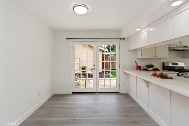 810 Hacienda Dr, Riverside, CA 92507 - interior space featuring light wood finished floors, french doors, and baseboards