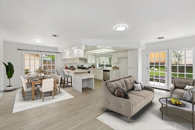 810 Hacienda Dr, Riverside, CA 92507 - living area featuring visible vents and light wood finished floors