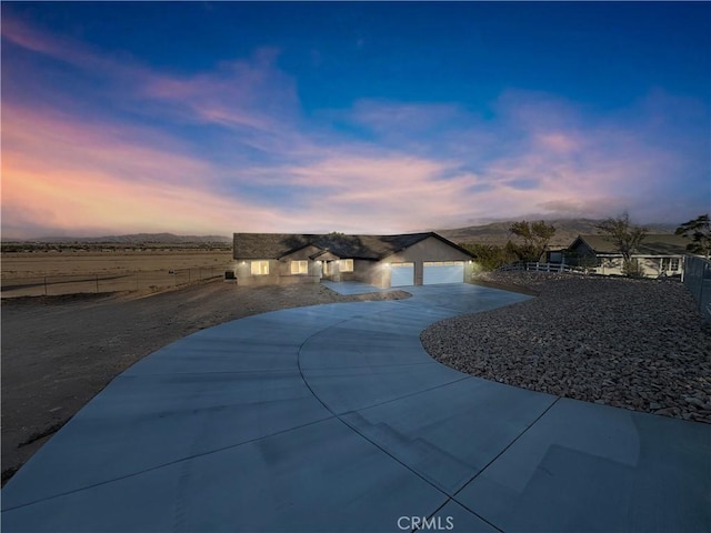 exterior space with concrete driveway