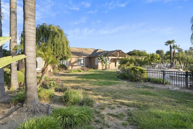 view of yard with fence