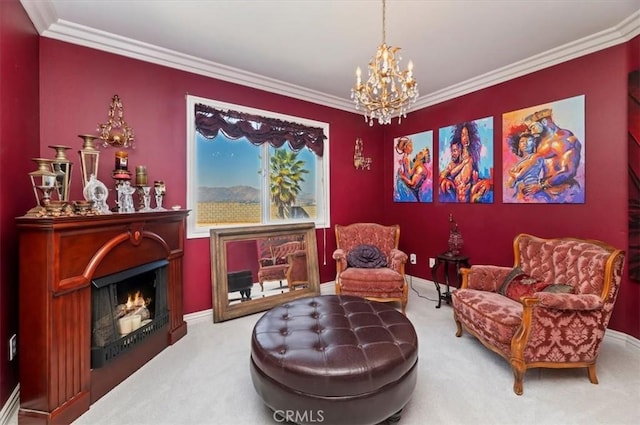 sitting room with crown molding, carpet floors, a lit fireplace, and a chandelier