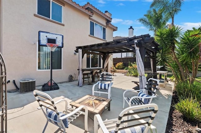 view of patio with a fire pit, fence, and a pergola