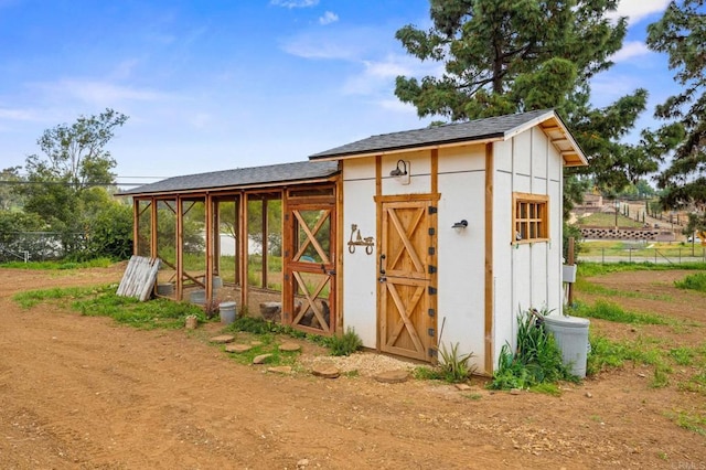 view of poultry coop with fence