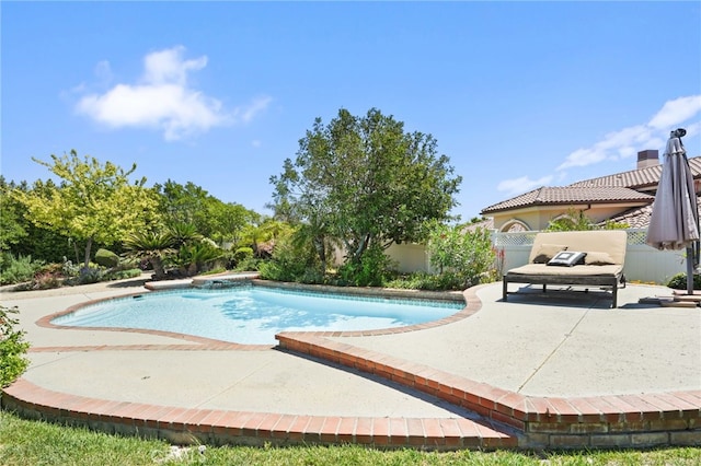 view of pool with a fenced in pool, fence, and a patio area