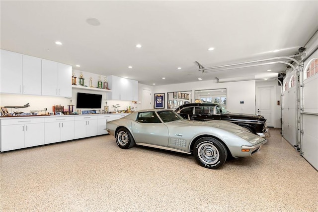 garage featuring recessed lighting
