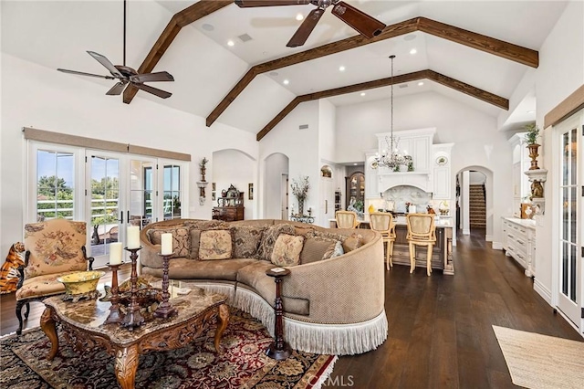 living room featuring high vaulted ceiling, arched walkways, ceiling fan, and beamed ceiling