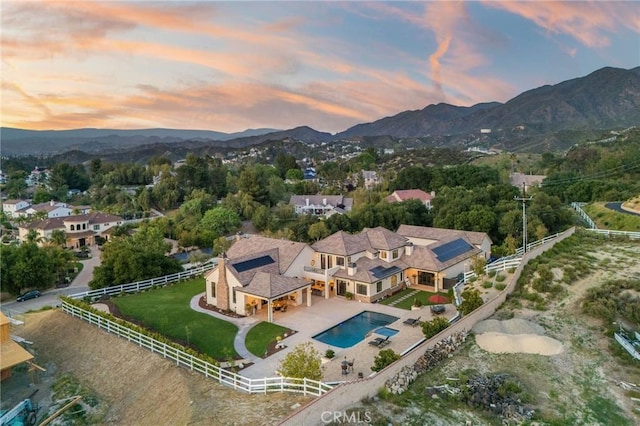 aerial view at dusk with a mountain view