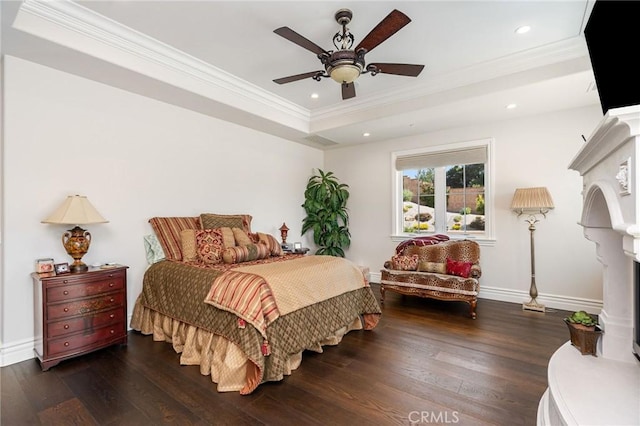 bedroom featuring recessed lighting, a fireplace, wood-type flooring, baseboards, and crown molding