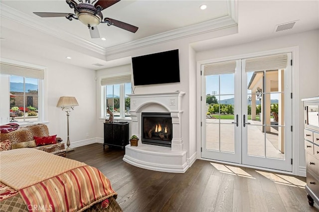 bedroom featuring ornamental molding, access to exterior, visible vents, and dark wood finished floors