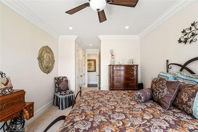 carpeted bedroom featuring ceiling fan, recessed lighting, ornamental molding, and baseboards