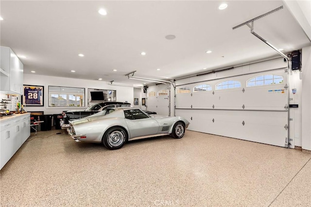 garage featuring recessed lighting