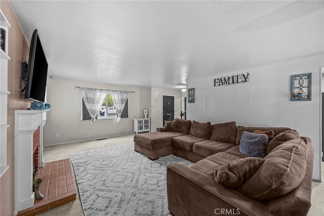 3520 Rosewood Pl, Riverside, CA 92506 - carpeted living room featuring a fireplace and visible vents