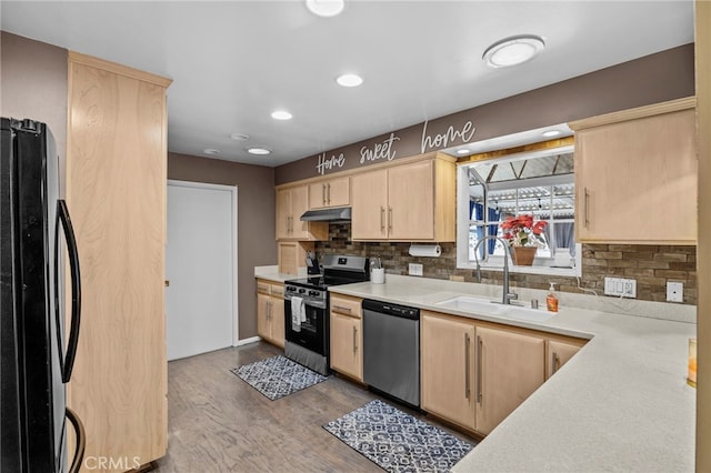 3520 Rosewood Pl, Riverside, CA 92506 - kitchen with light brown cabinetry, appliances with stainless steel finishes, a sink, light countertops, and under cabinet range hood