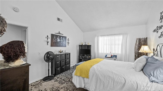 carpeted bedroom featuring visible vents, high vaulted ceiling, and baseboards
