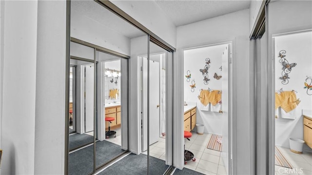 interior space featuring a textured ceiling