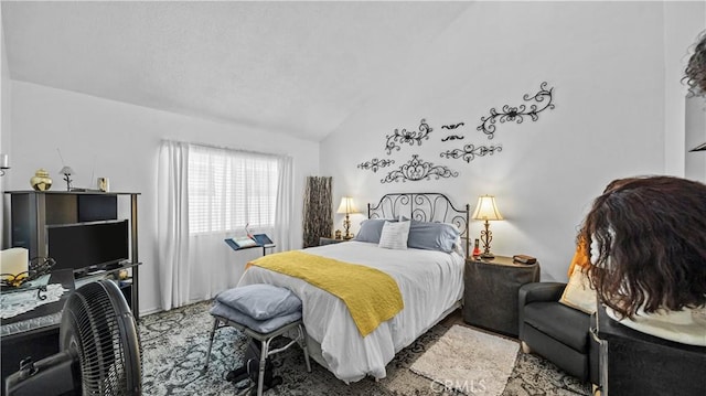 bedroom with vaulted ceiling