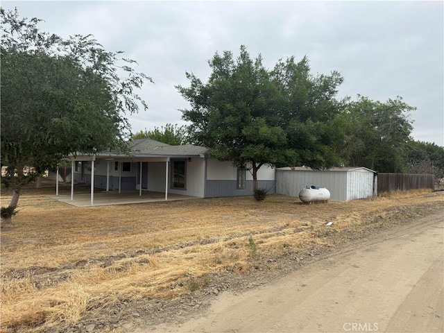 14685 17th Ave, Lemoore, CA 93245 - exterior space with a patio and an outdoor structure