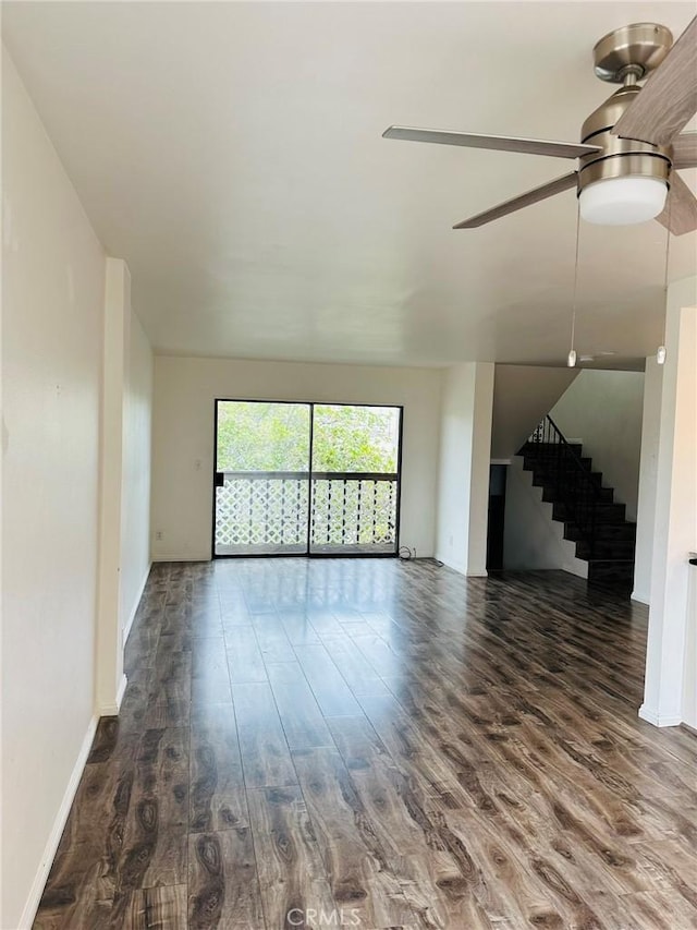 850W 157th Unit 6, Gardena, CA 90247 - unfurnished living room featuring baseboards, a ceiling fan, wood finished floors, and stairway