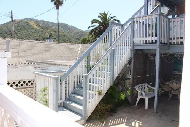 stairway featuring a mountain view