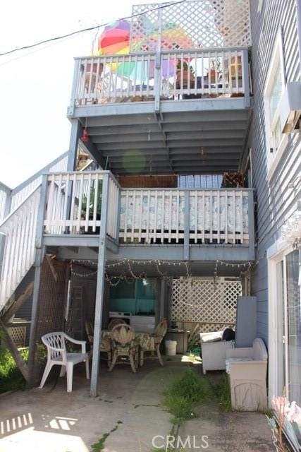 320 Metropole Ave Unit B, Avalon, CA 90704 - back of house featuring a patio area and a balcony