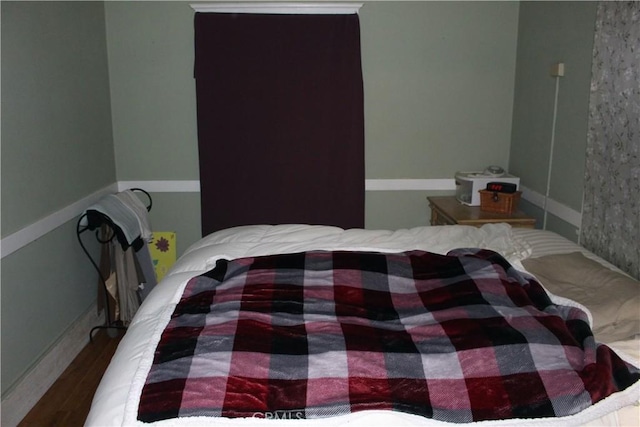 320 Metropole Ave Unit B, Avalon, CA 90704 - bedroom featuring wood finished floors