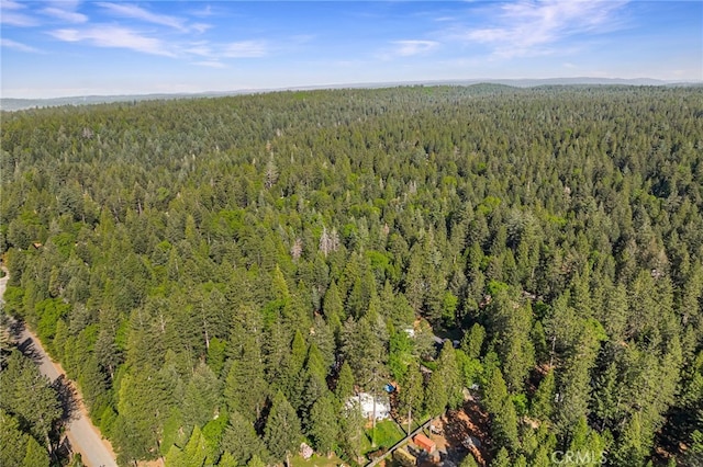 bird's eye view featuring a forest view