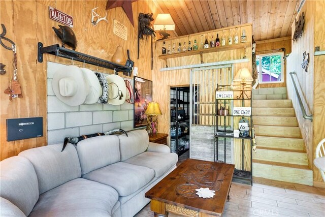 37547 Oak Glen Rd, Oak Glen, CA 92399 - living room featuring wooden ceiling, wood finished floors, stairs, and wooden walls
