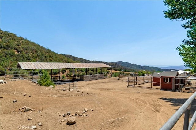 37547 Oak Glen Rd, Oak Glen, CA 92399 - exterior space featuring a rural view, fence, an outbuilding, a storage shed, and a mountain view