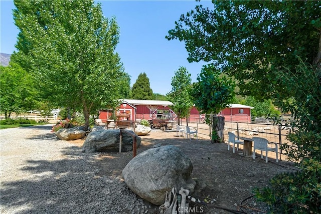 37547 Oak Glen Rd, Oak Glen, CA 92399 - view of yard with fence and an outbuilding