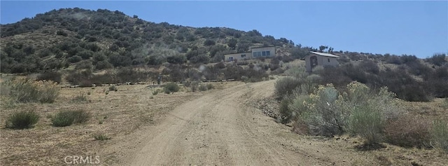 view of mountain feature with a rural view