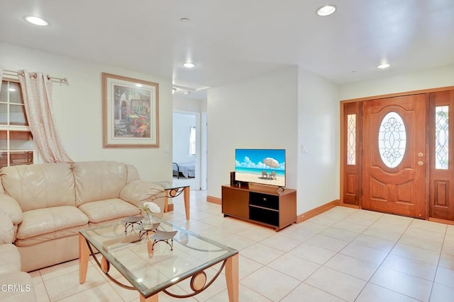 living room featuring recessed lighting and baseboards