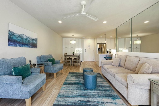999 N Pacific St Unit E108, Oceanside, CA 92054 - living area featuring recessed lighting, ceiling fan, and light wood-style floors